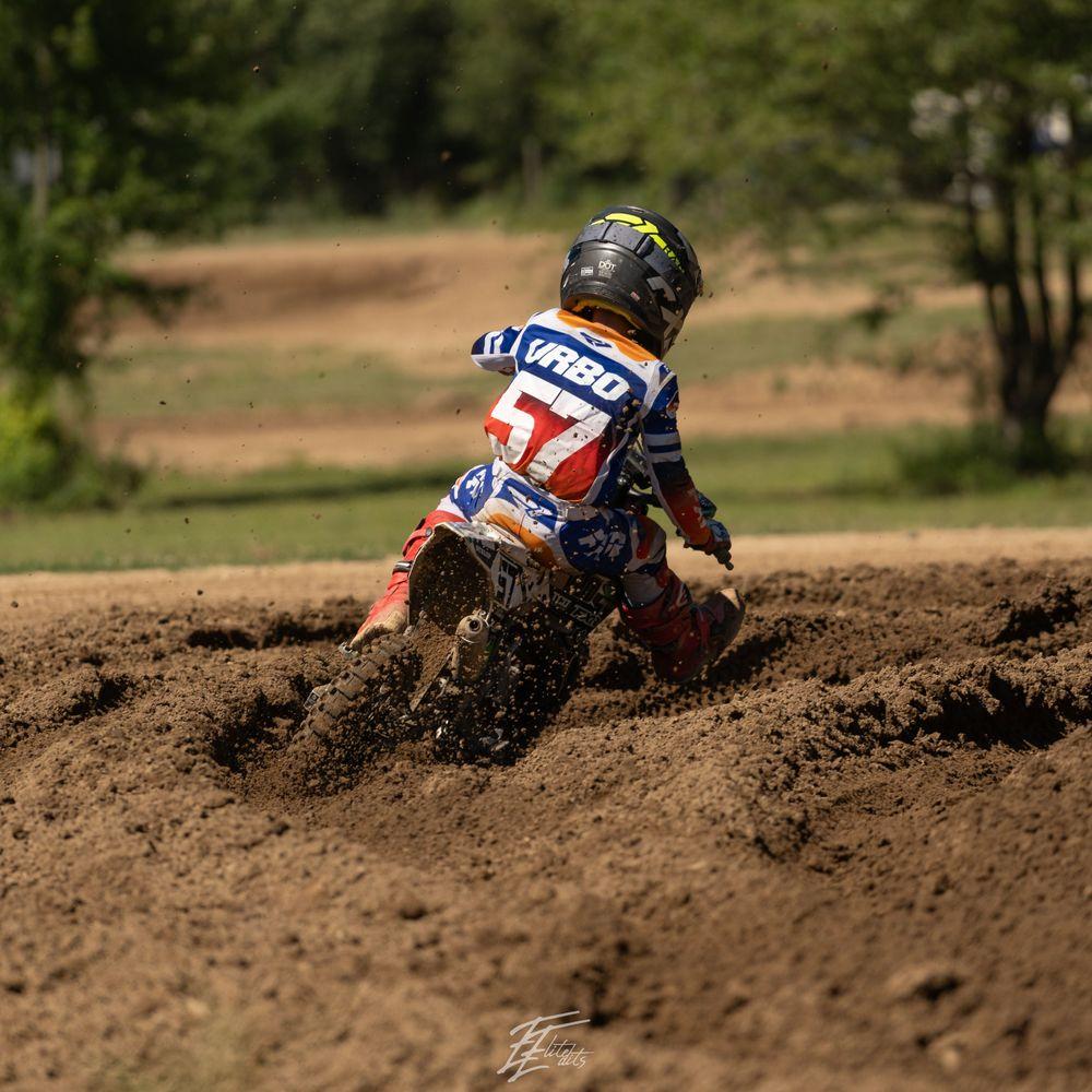 Rider airborne over the tree line